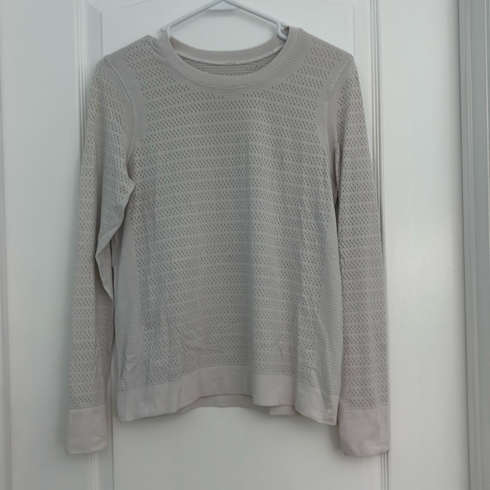 Lululemon white long sleeve top with netting, in decent condition
